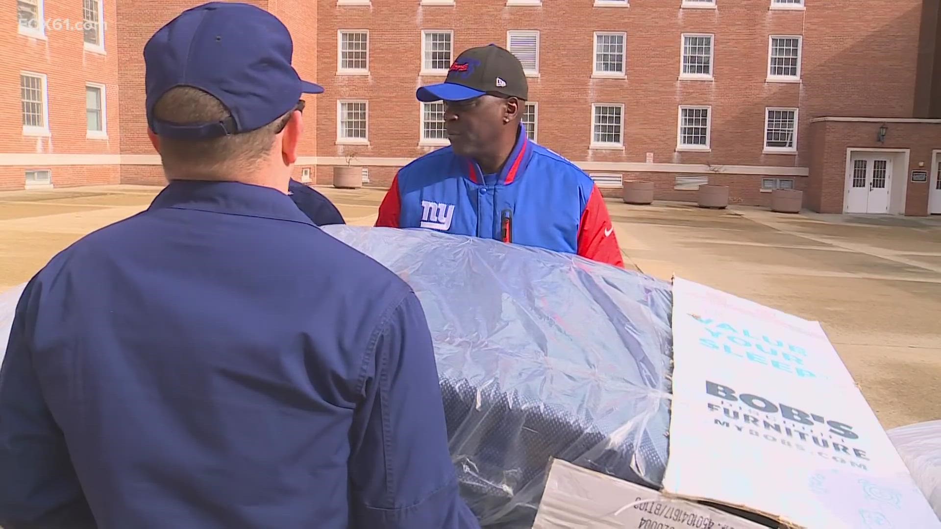 The Giants Ottis “OJ” Anderson, who won two Super Bowls as a running back for the team helped give them out in New London.