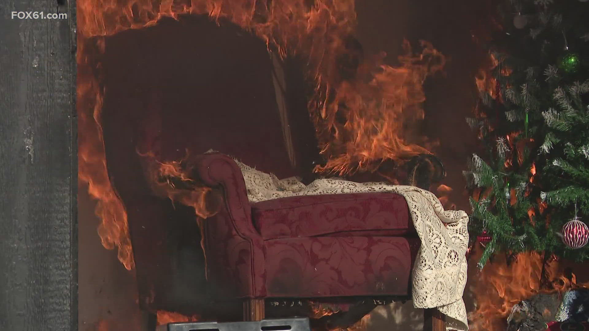 A demonstration at the Connecticut Fire Academy shows how dangerous holiday decorations such as Christmas trees can be. Firefighters simulated Christmas tree fires.