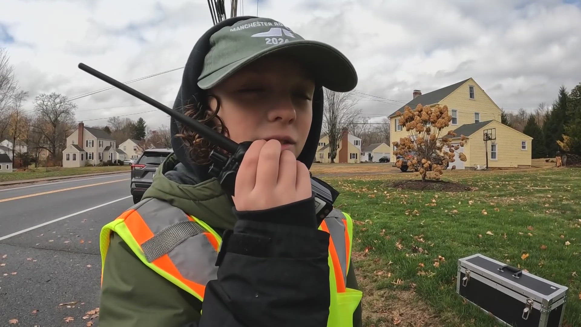 The BEARS (Better Emergency Amateur Radio Service) ensure safety at the Manchester Road Race, with 55 ham radio operators, including a 10-year-old new team member.