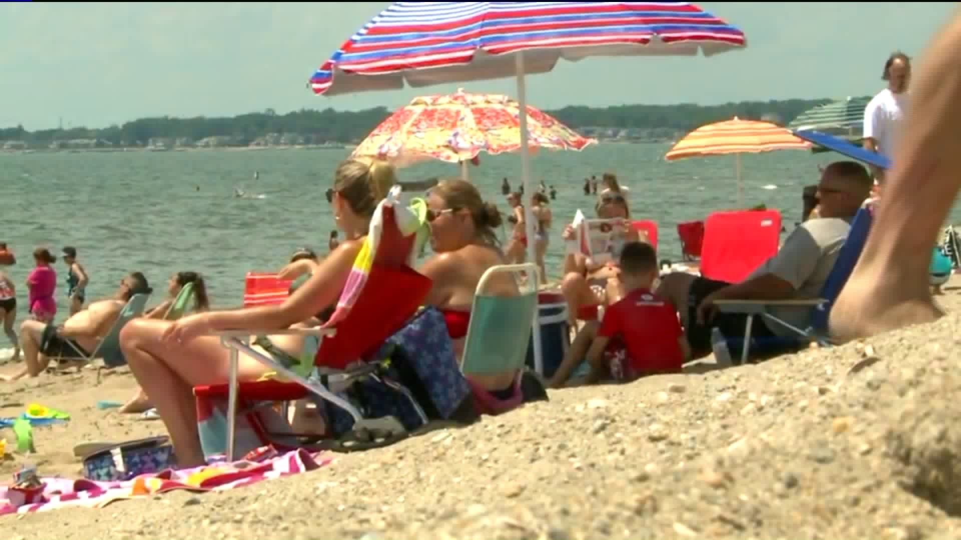 Crowds flock to the beach for the holiday