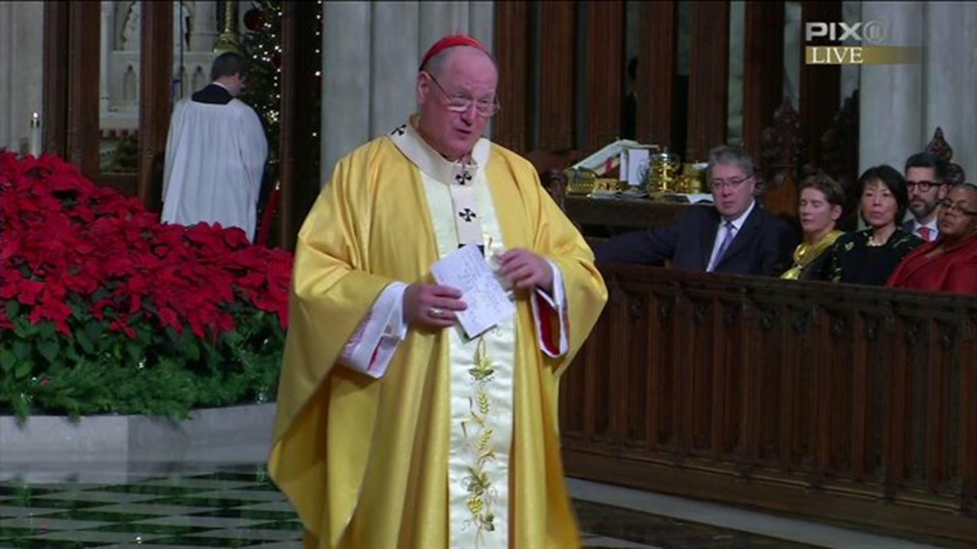 Cardinal Dolan discusses refugees at Christmas mass