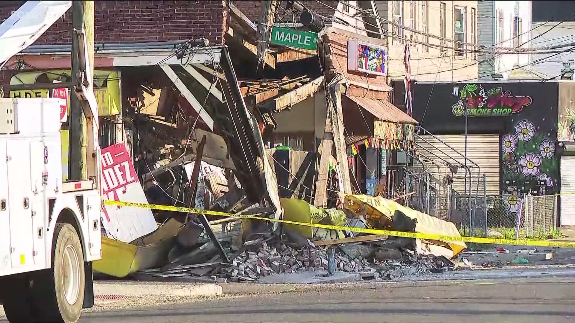 The crash happened in the area of Maple Avenue and Cherry Street and caused the front of a building to fall.