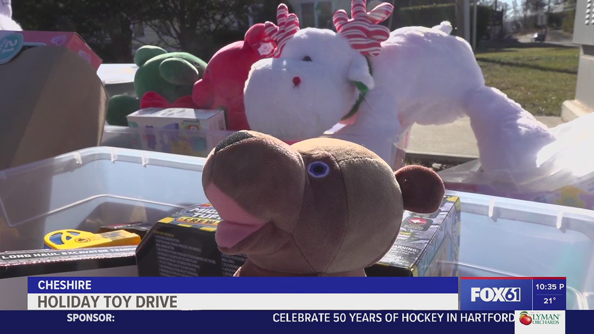 Christmas Joy filled the sidewalk at the corner of Old Towne Road and South Main Street as people came to deliver toys for children in need.