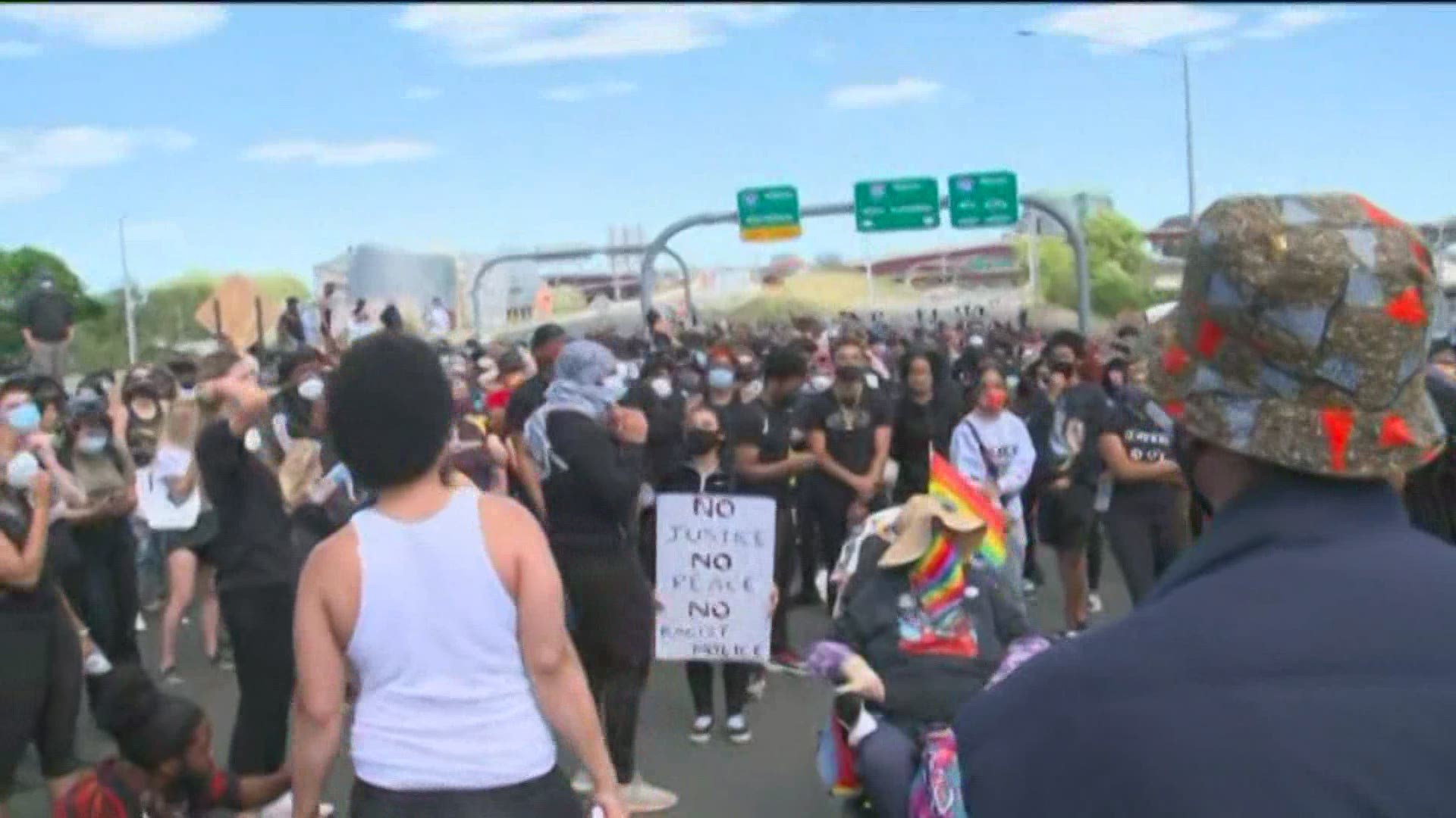 Demonstrators were seen outside the New Haven Police Department, waiting to talk with Mayor Justin Elicker.