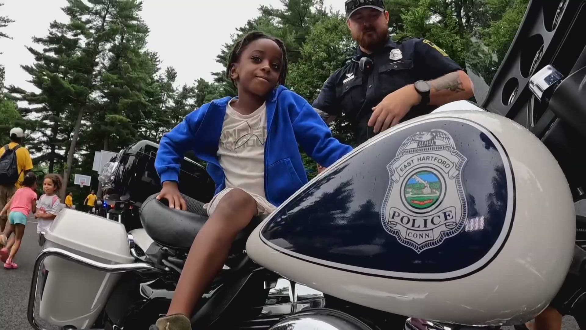 Every year, law enforcement officers join the ranks of campers at Camp Courant in Farmington. The free summer program held its annual Law Enforcement Day Wednesday.