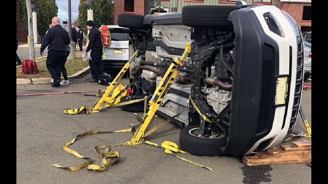 Car flips in Quinnipiac parking lot after crash