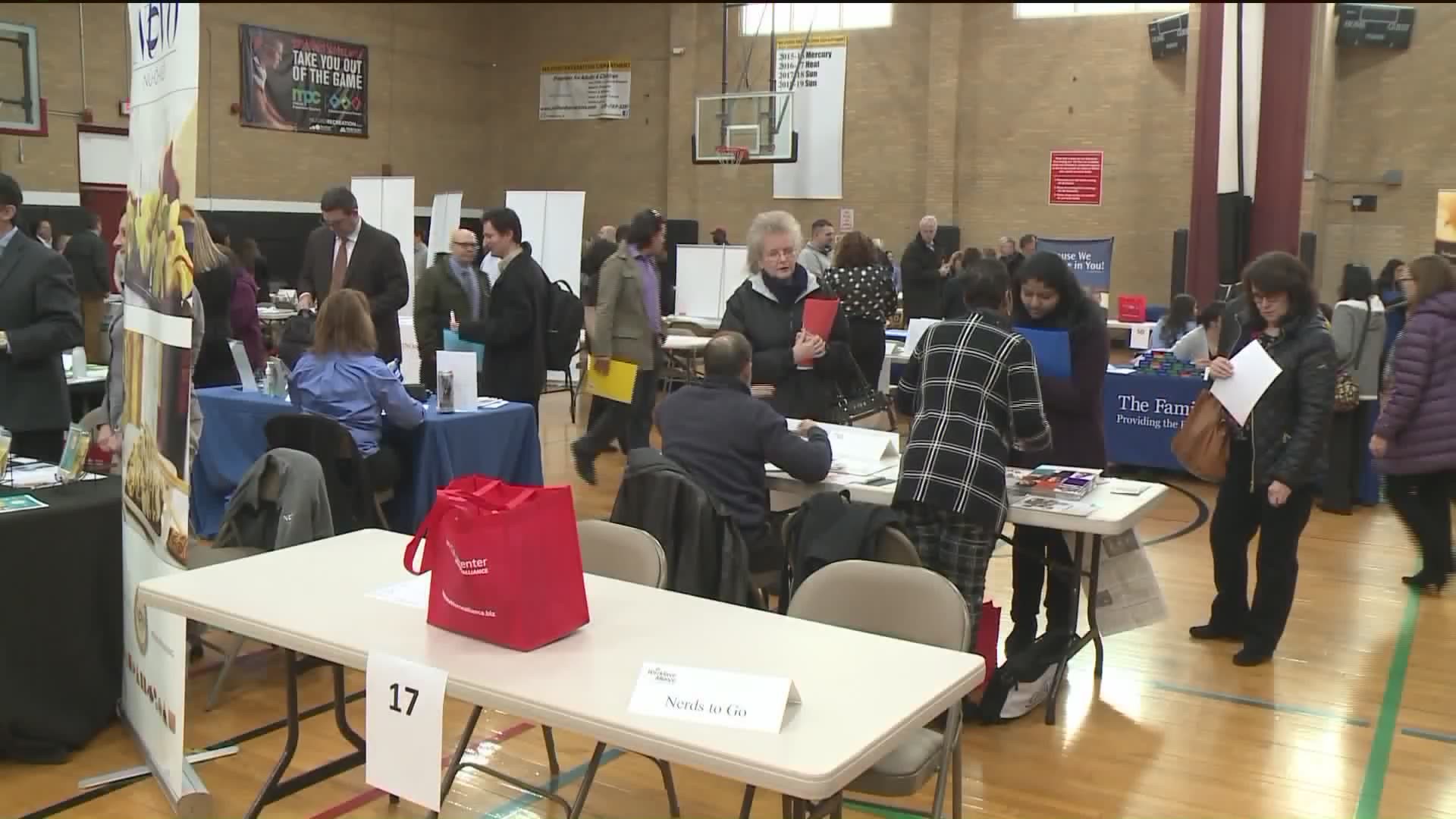 Several hundred job seekers and nearly 70 employers packed the Parsons Center gym between 11 AM and 2 PM.