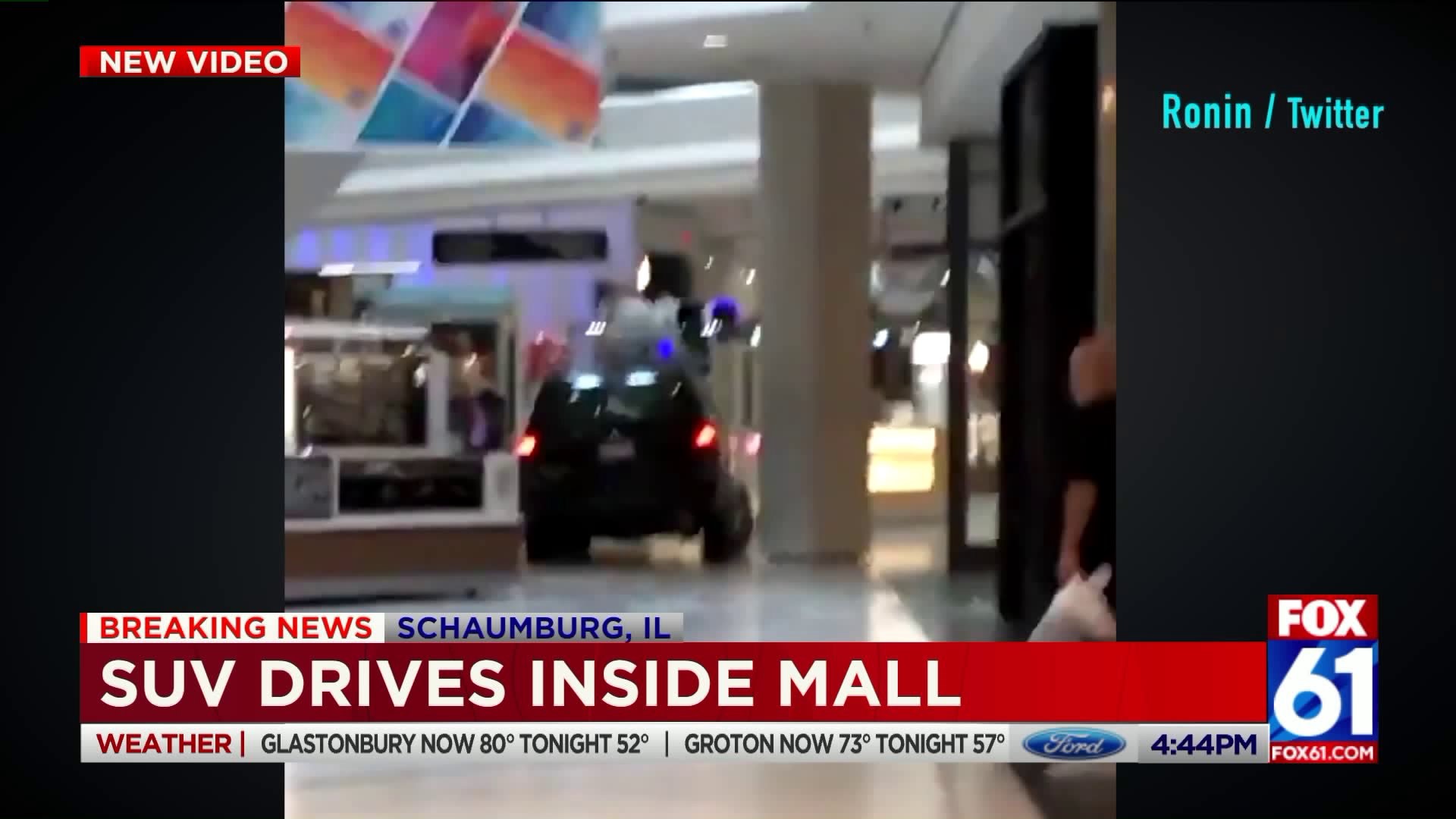 SUV drives inside mall