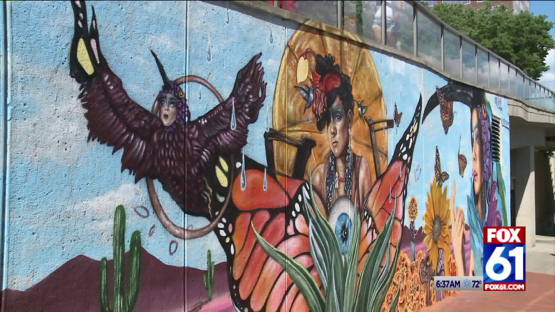 Local artist unveils Cirque Du Soleil inspired mural in downtown Hartford