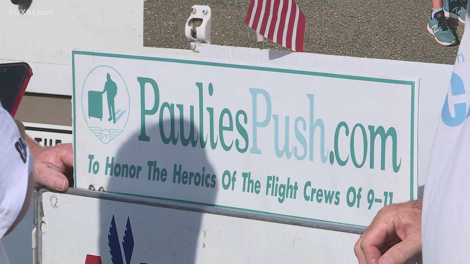 Former flight attendant Paul Veneto is pushing an airline beverage cart this year from Boston to Ground Zero in New York City to honor lives lost on Sept. 11, 2001.