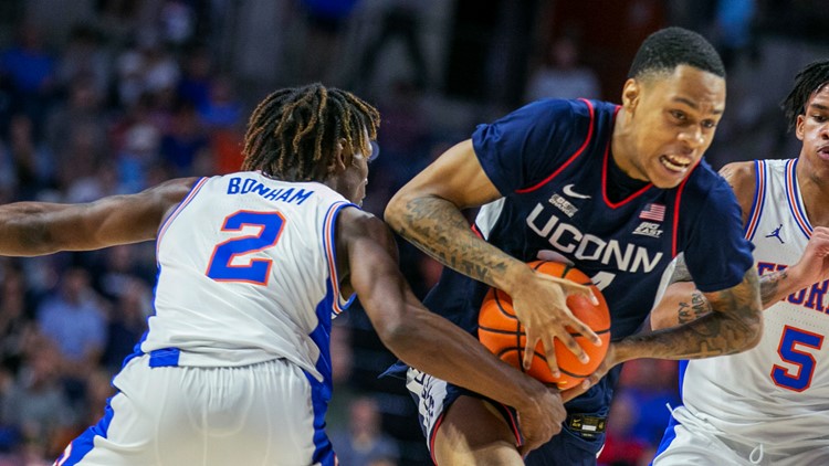 No. 5 UConn remains undefeated beating Florida 75-54