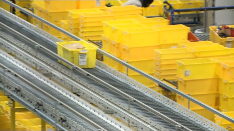 Amazon Fulfillment Center in Windsor busy packing holiday gifts