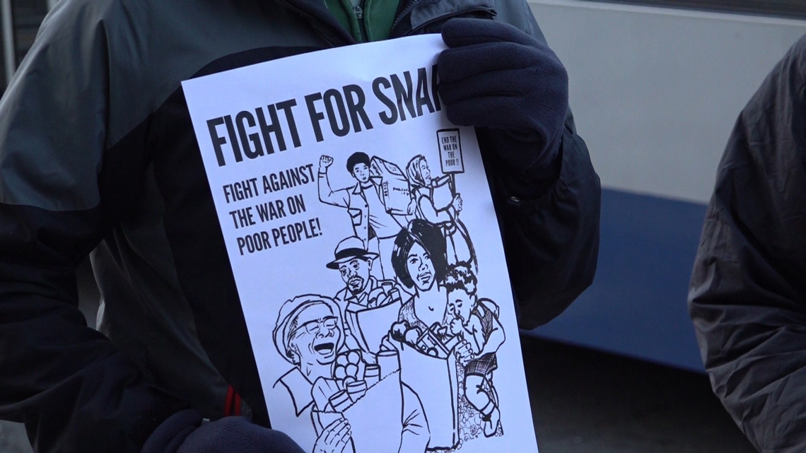 Protesters rally outside Connecticut DSS against welfare program cuts