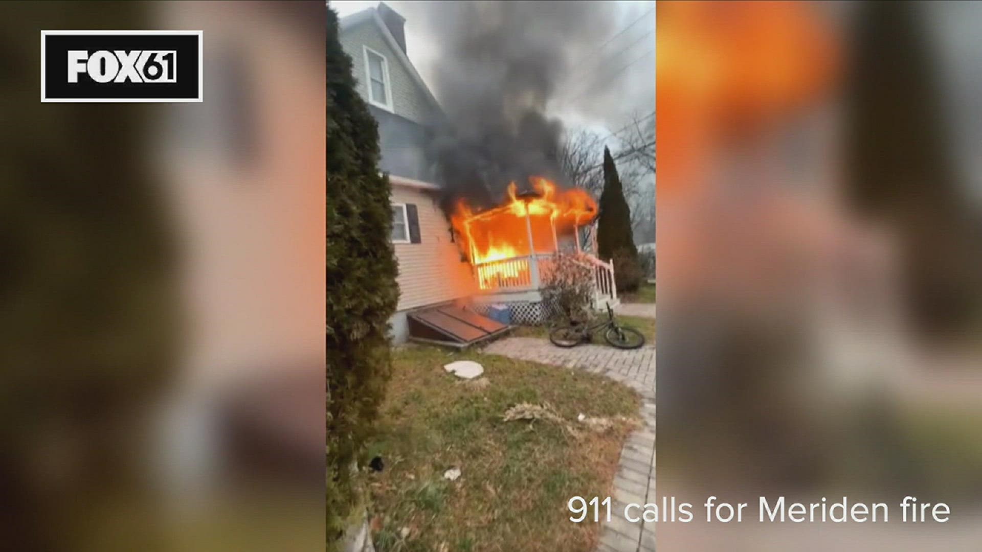 Firefighters pulled an unconscious person from the home and four firefighters were hurt.