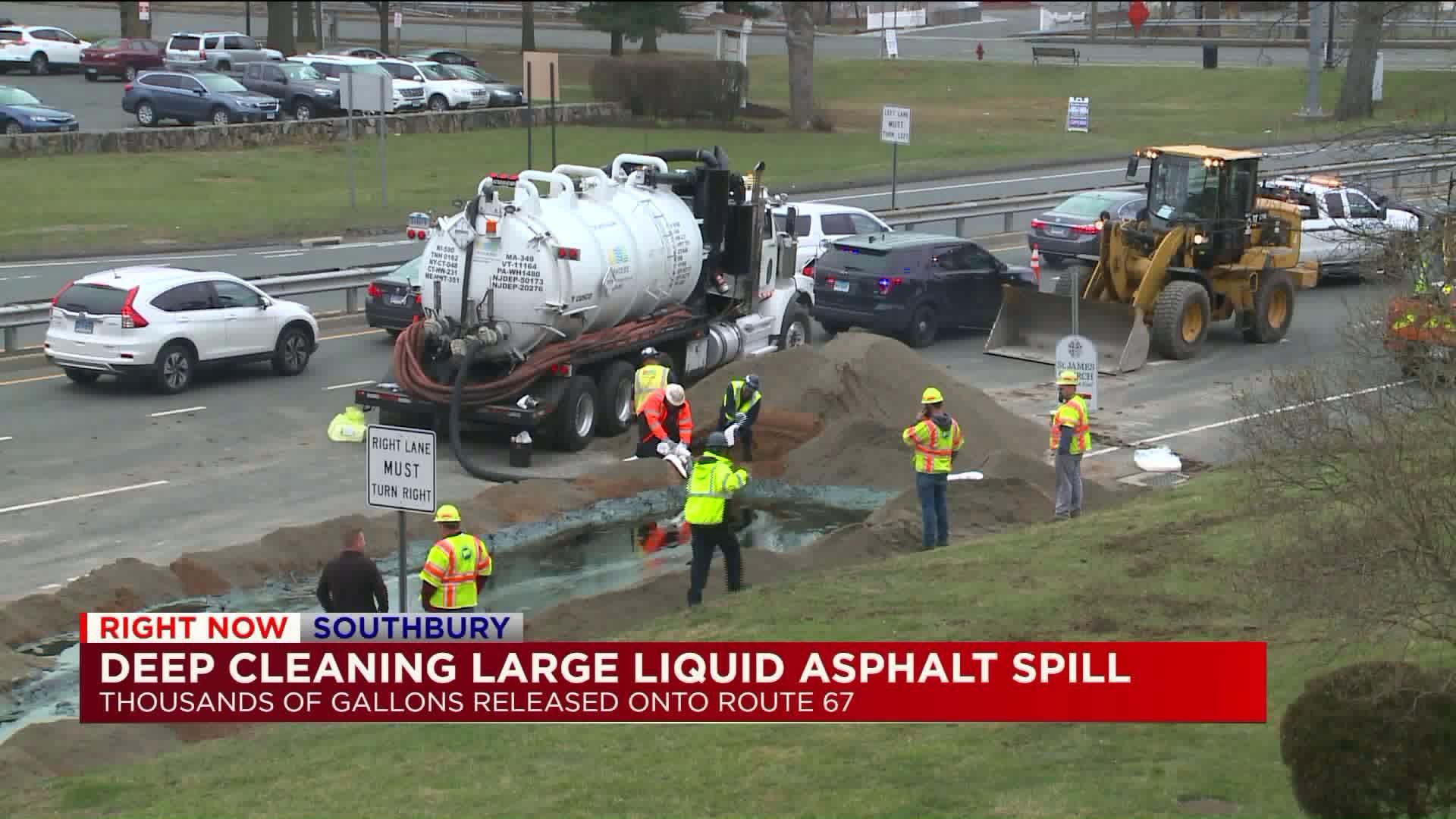 DEEP cleaning up liquid asphalt spill
