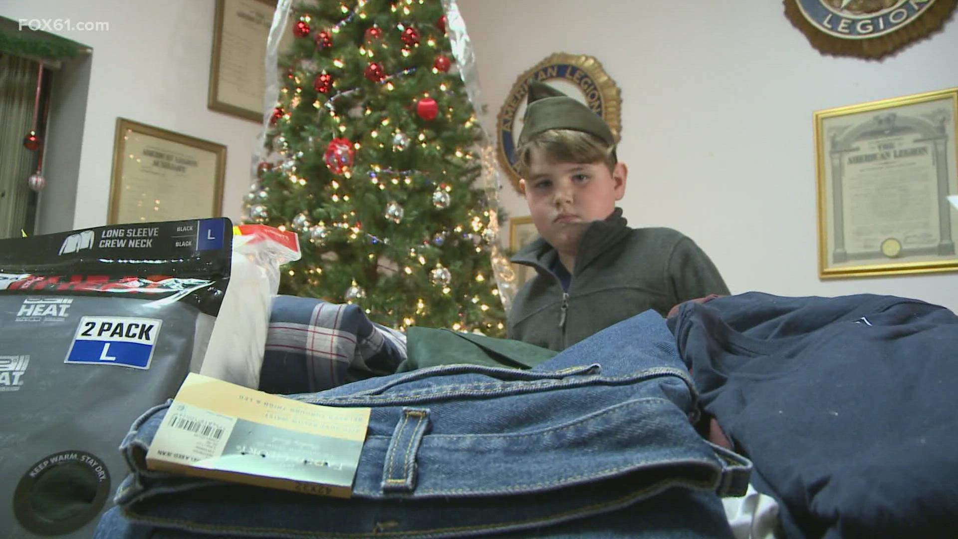 Owen Zavatone, 9, of Old Saybrook collected clothes and toiletries as holiday gifts for local veterans.