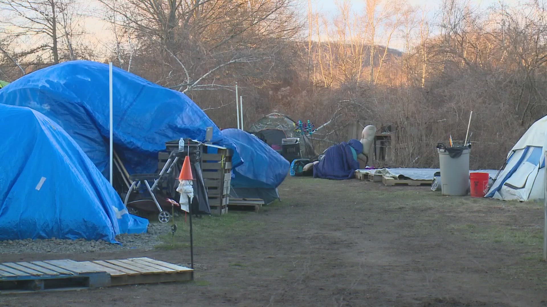 The row of tents and tarps has been in the area for years, but recently problems stemming from the location have caused the city to take action.