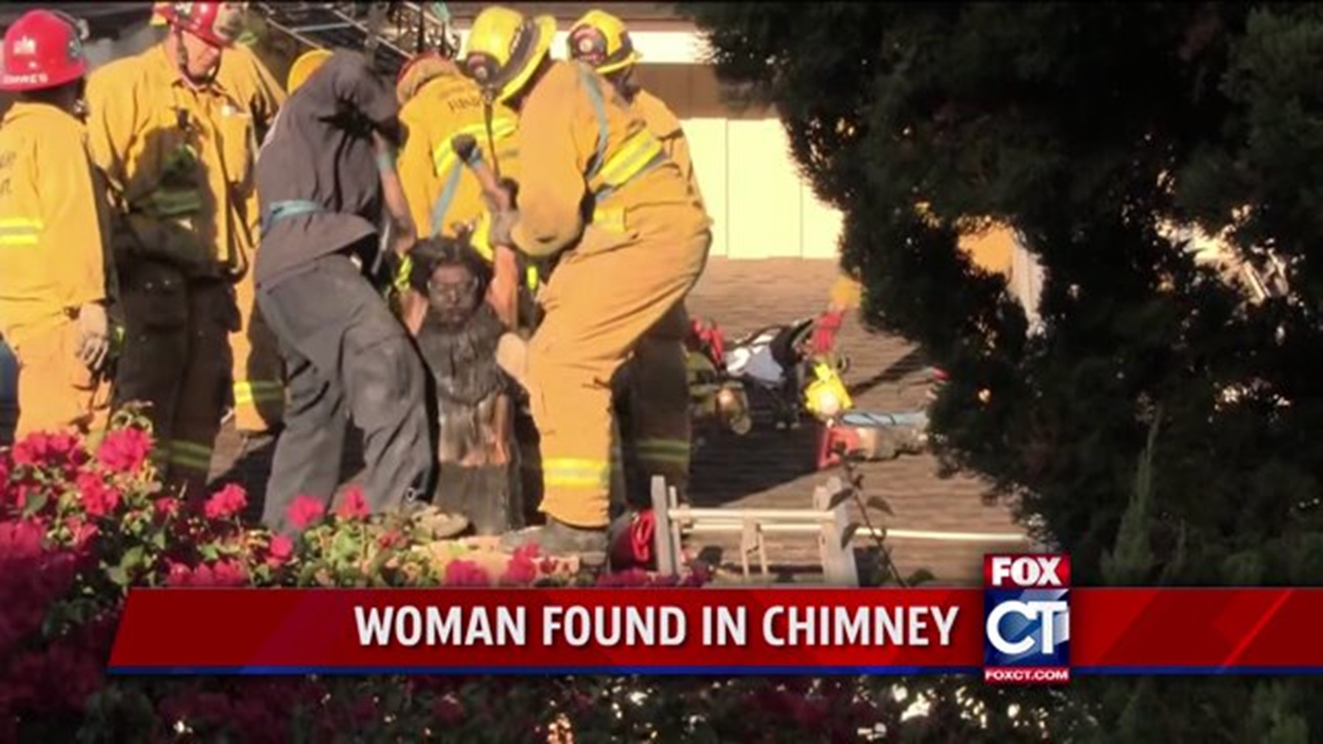 Rescue crews save woman from chimney