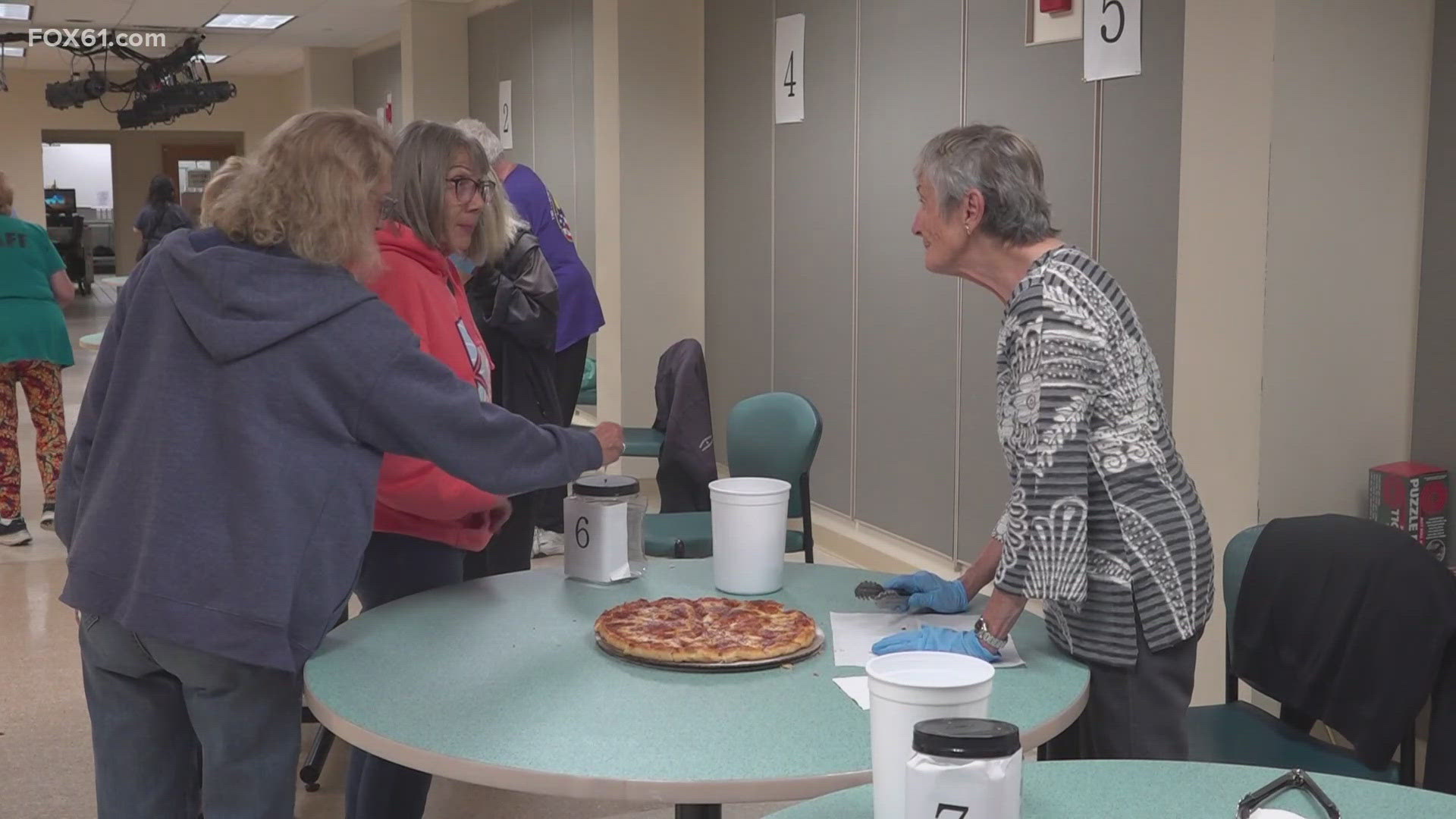 The community tasting event brought together 12 local pizza shops, giving attendees the chance to sample slices, discover new flavors and cast their votes.