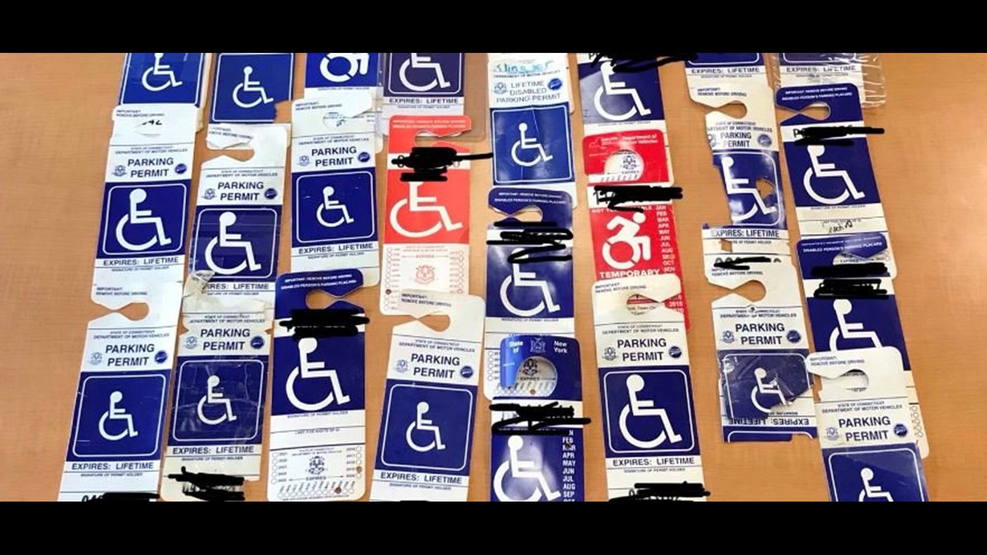 Hartford police seize 27 handicapped parking placards at Xfinity
