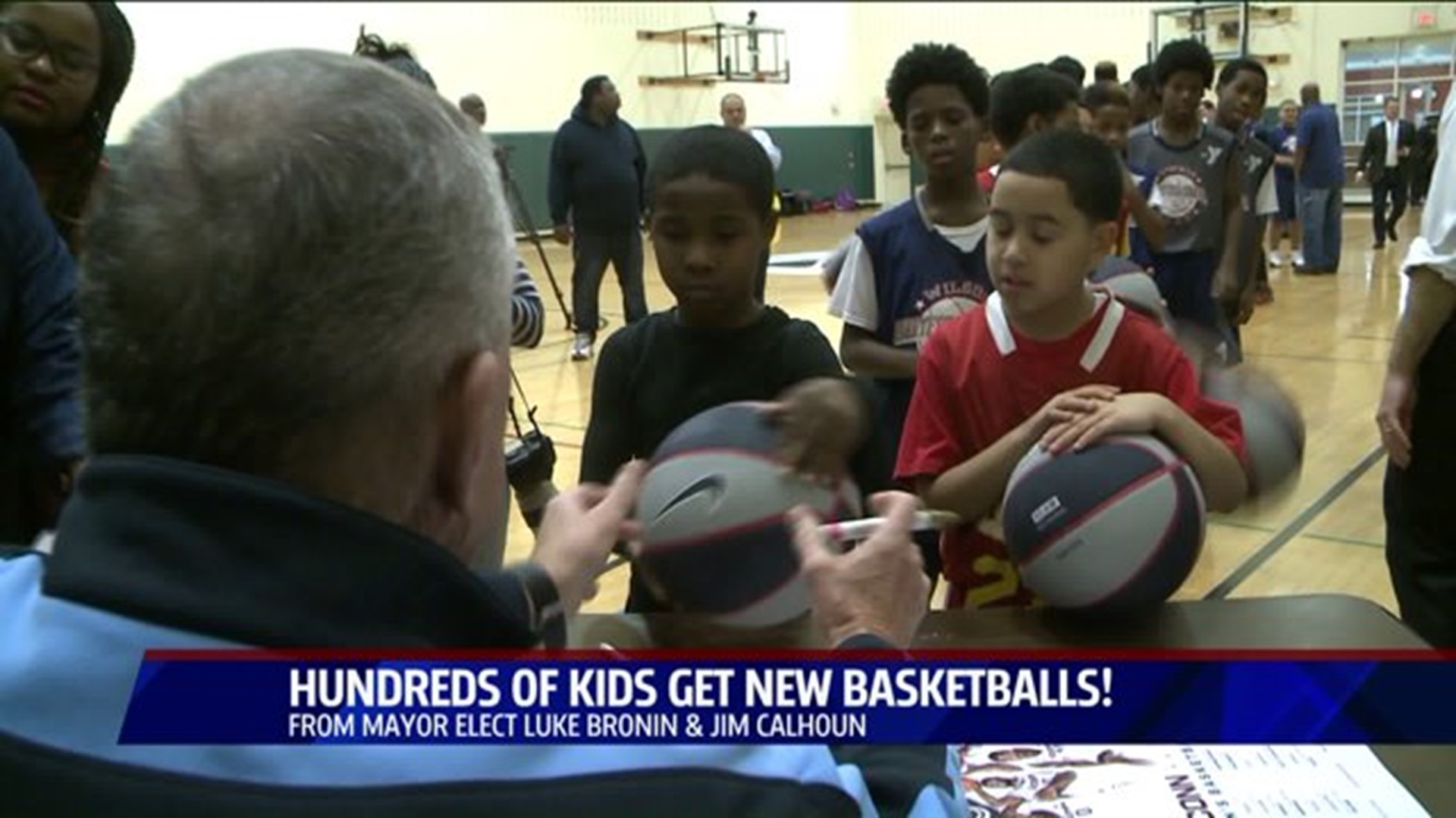 Hartford kids get to meet Jim Calhoun at basketball giveaway
