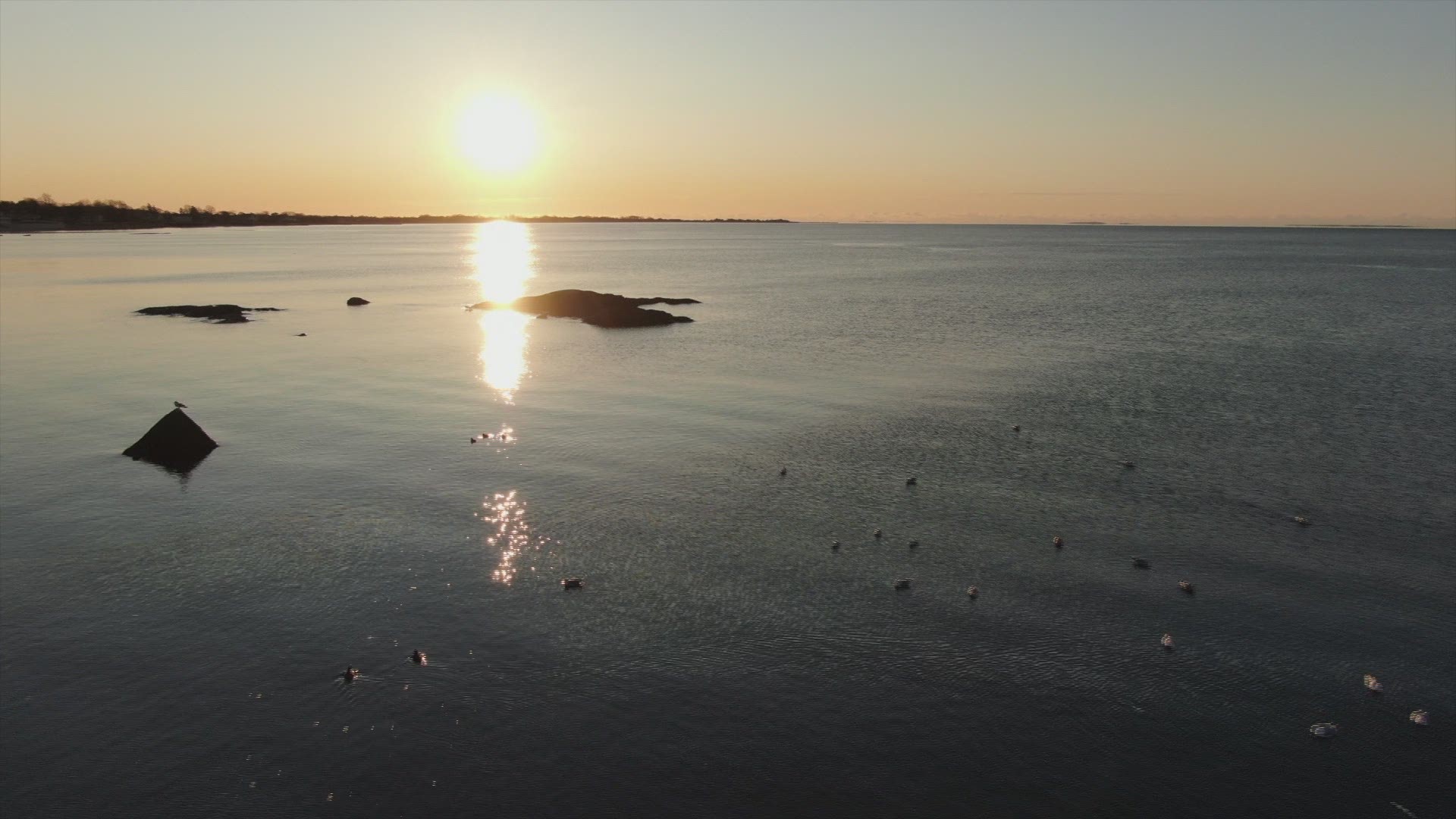 SKY61 was in the skies over East Wharf Beach in Madison! The sun and water look great, but it's still 120 days until summer.
