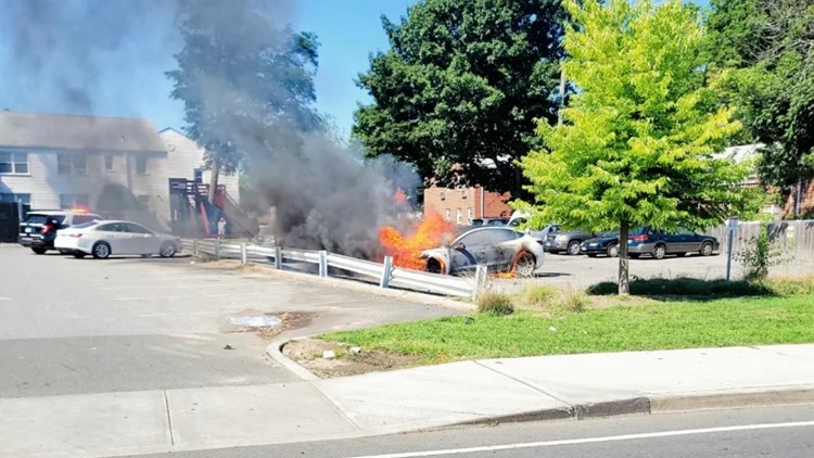 PHOTOS: Tesla catches on fire in Stamford, takes 42 minutes to extinguish