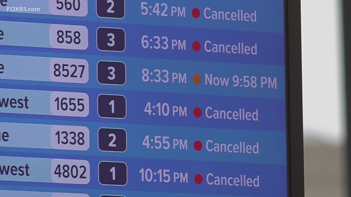 Some travelers at Bradley International Airport hold out hope, others drive through blizzard