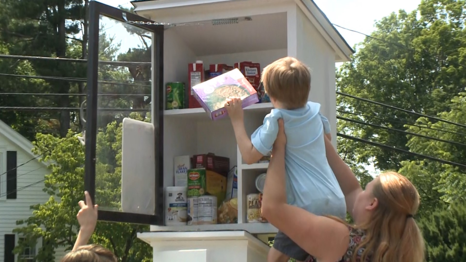 Volunteers collect and stock non-perishable food items in community pantries so no one goes hungry.