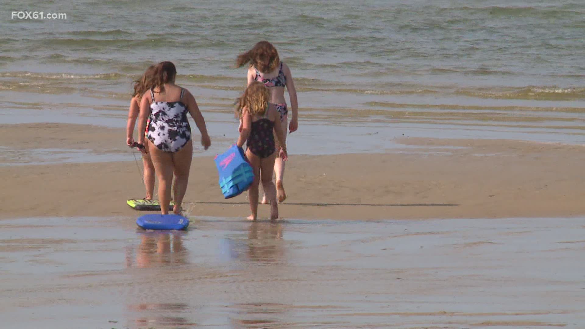 People flocked to Rocky Neck State Park in East Lyme bright and early to soak in the sunshine and cool off in the water.