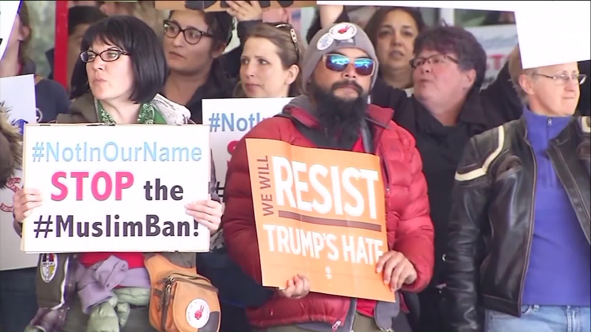 Malloy, ACLU blasts President Trump`s new travel ban