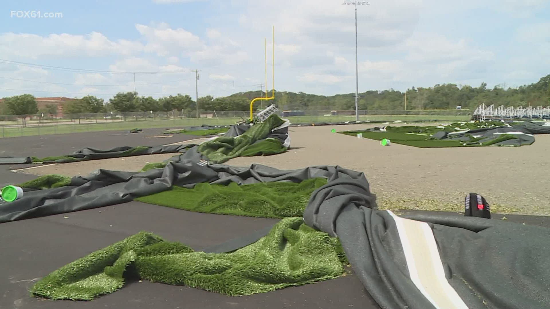 Workers were installing the turf as the storm swept over them. The field is now considered a complete loss.