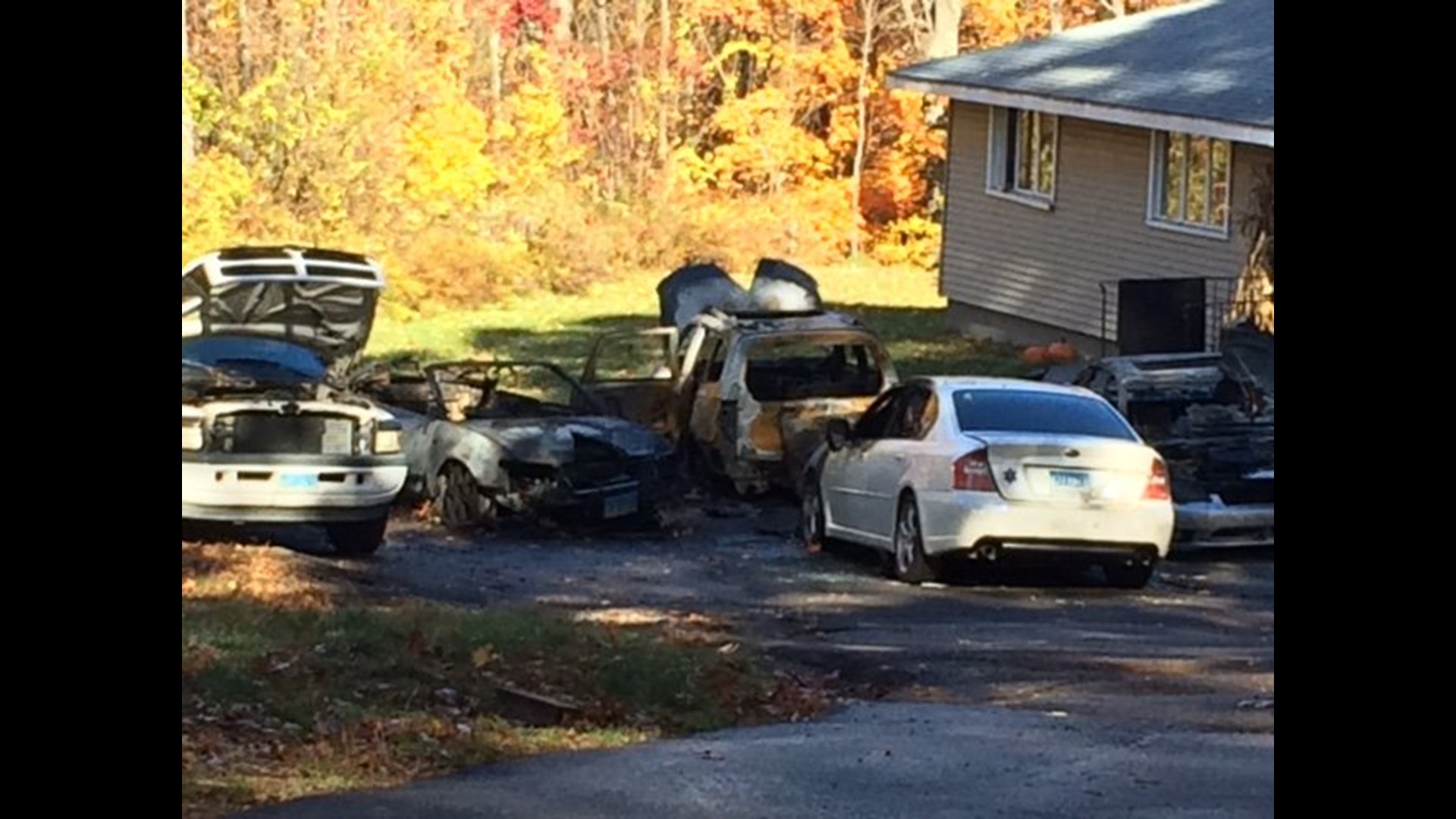 Officials investigate after 5 cars catch on fire in Ellington, damaging