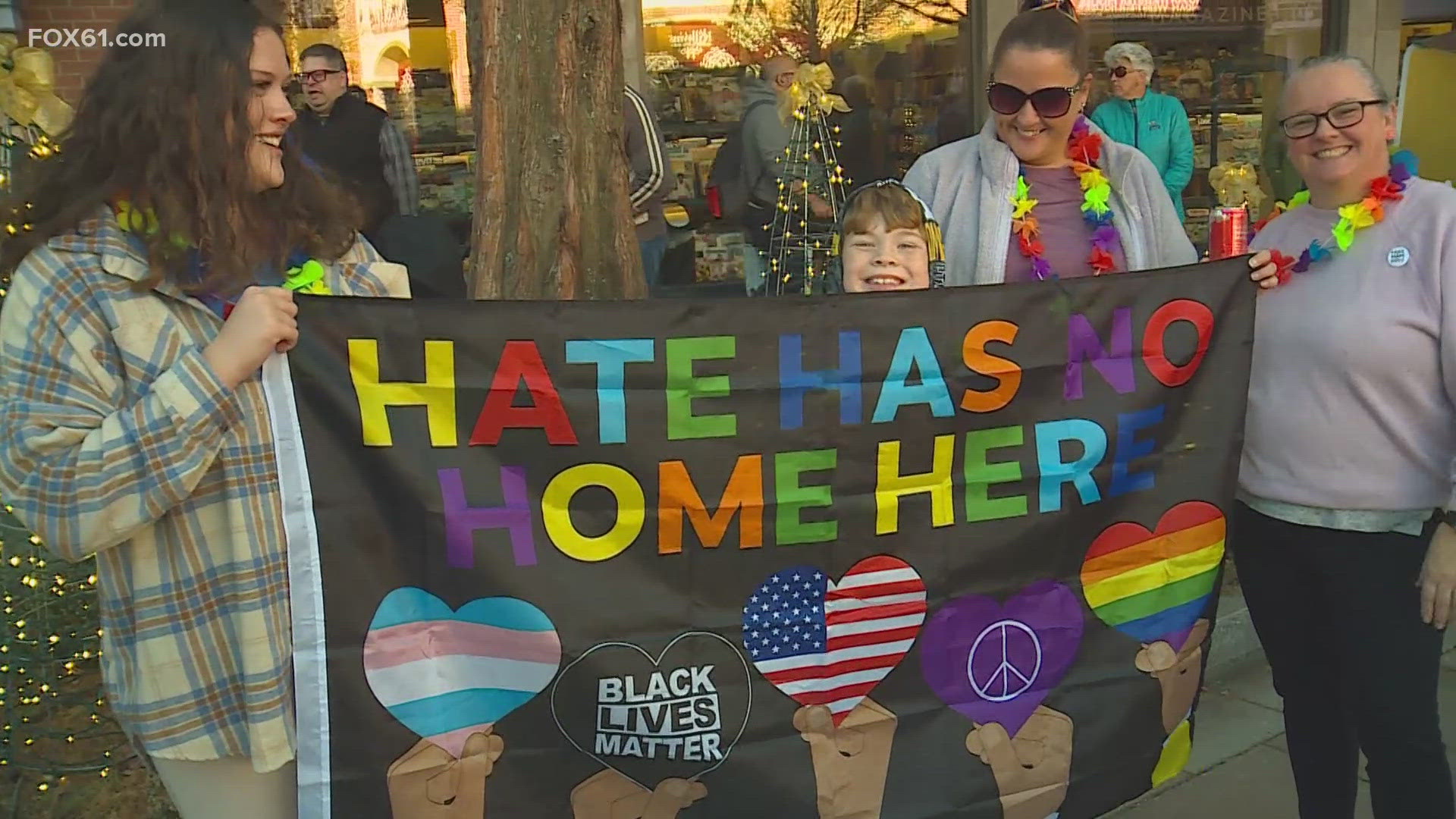 Hundreds of LGBTQ+ members attended the rally wearing their rainbow pride, holding flags and signs and sharing words of encouragement and hope.