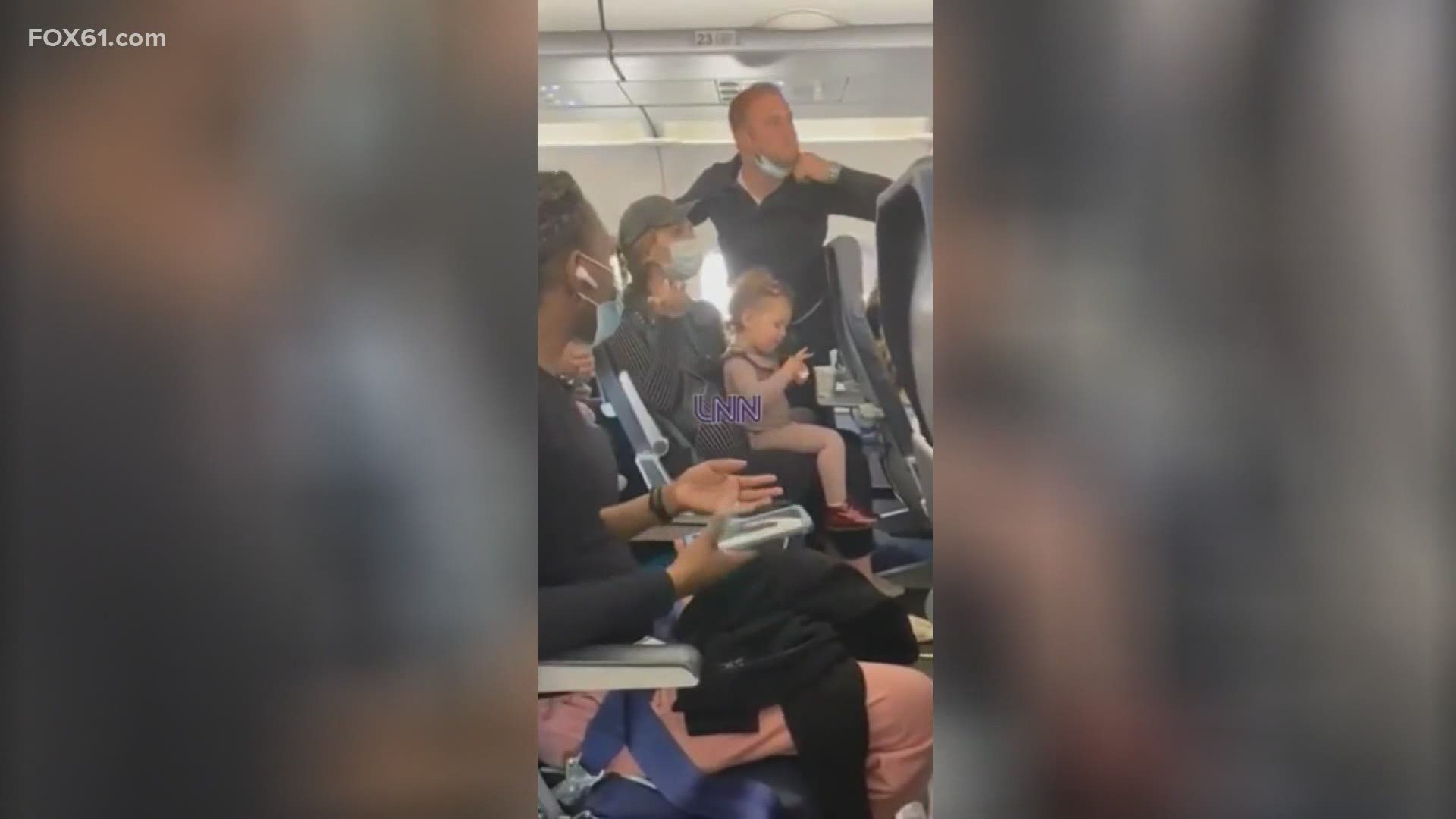 Cellphone footage showed a flight attendant addressing the family after it was noticed that the toddler was not wearing a mask.