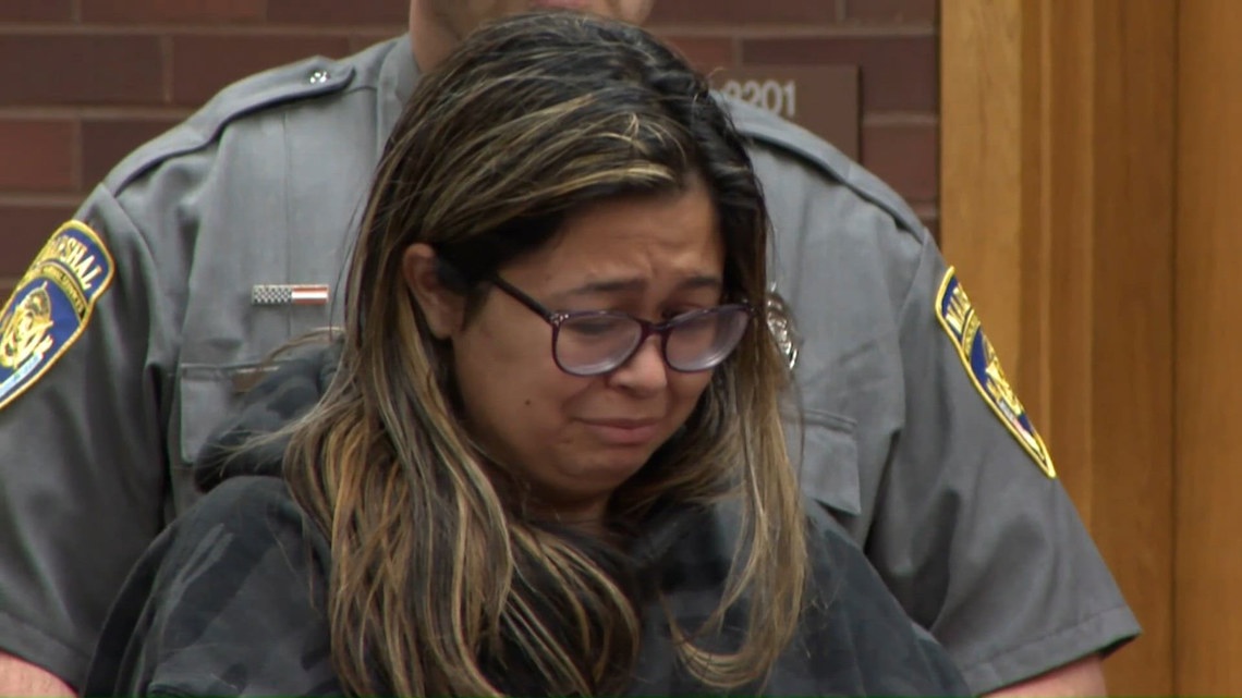 Woman accused of killing baby left in dumpster appears in Danbury court