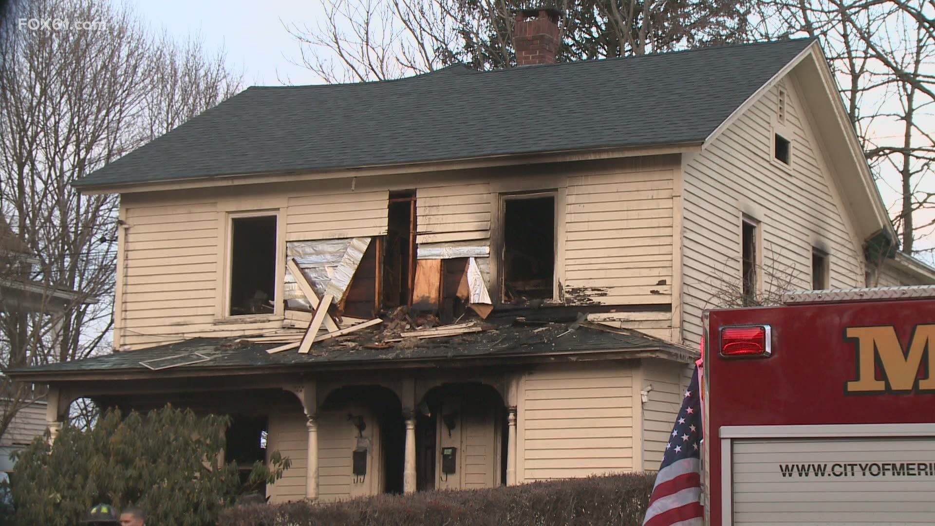 Eight people in the two-family home made it out safely; a firefighter was taken to the hospital for an ankle injury.