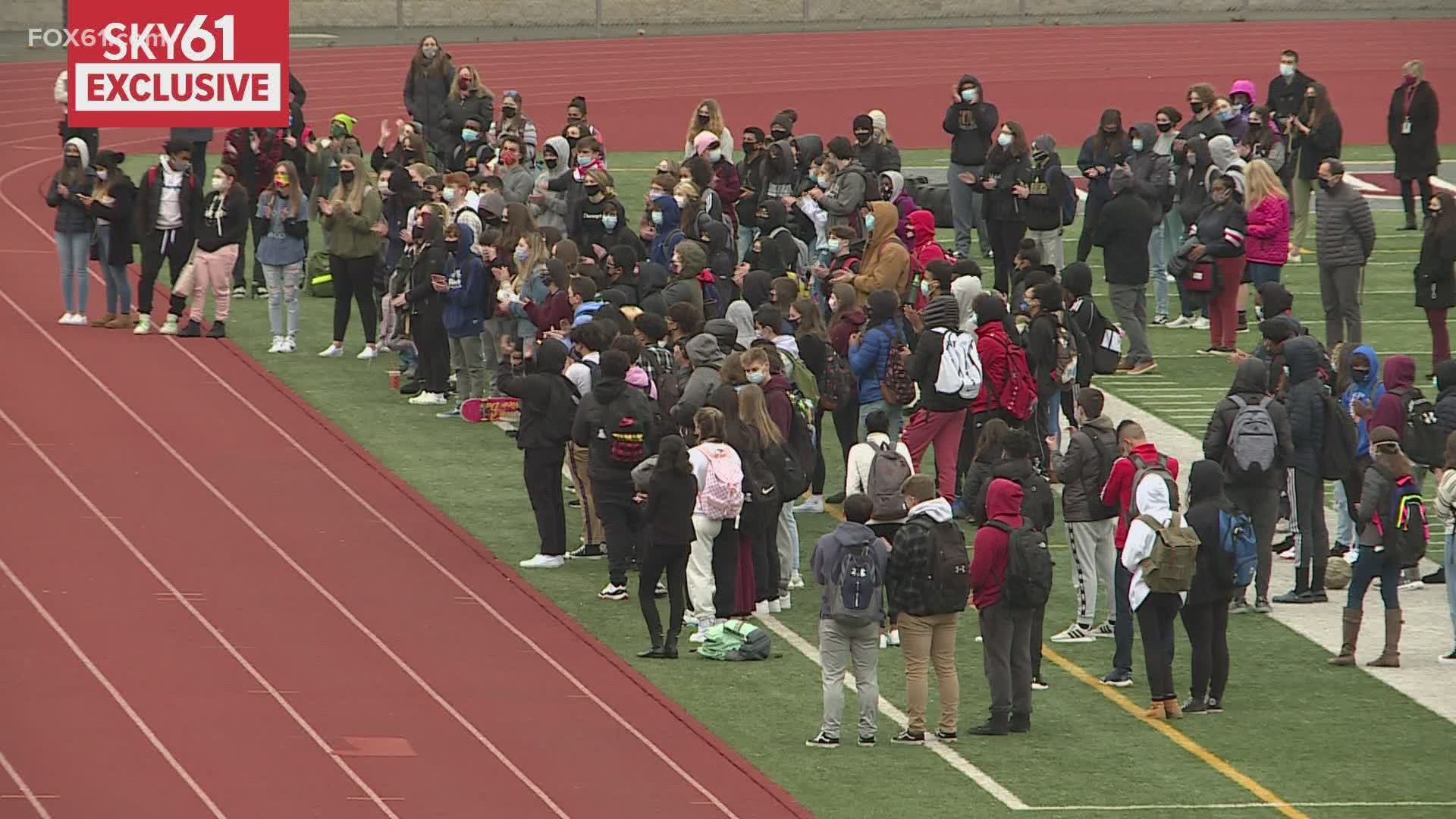 Over 100 students along with a few teachers stood on the football field and read their self-written speeches.