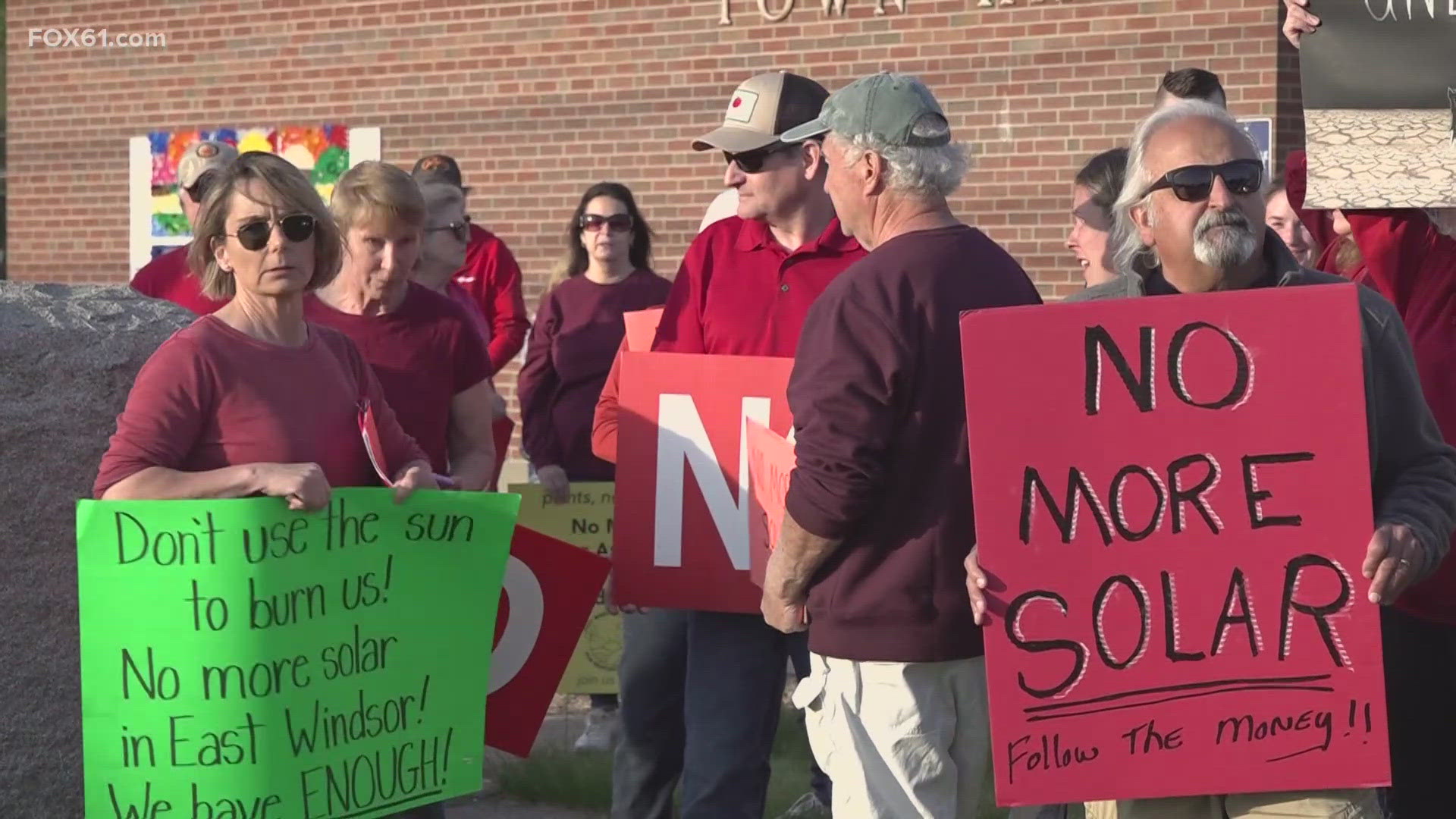 Dozens of people in East Windsor are rallying against an attempt to expand an existing solar project in town. Locals explained why they're against the proposal. 