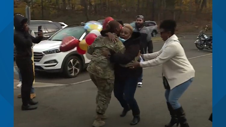 Soldier Surprise | Daughter surprises family with return home at Meriden Thanksgiving football game