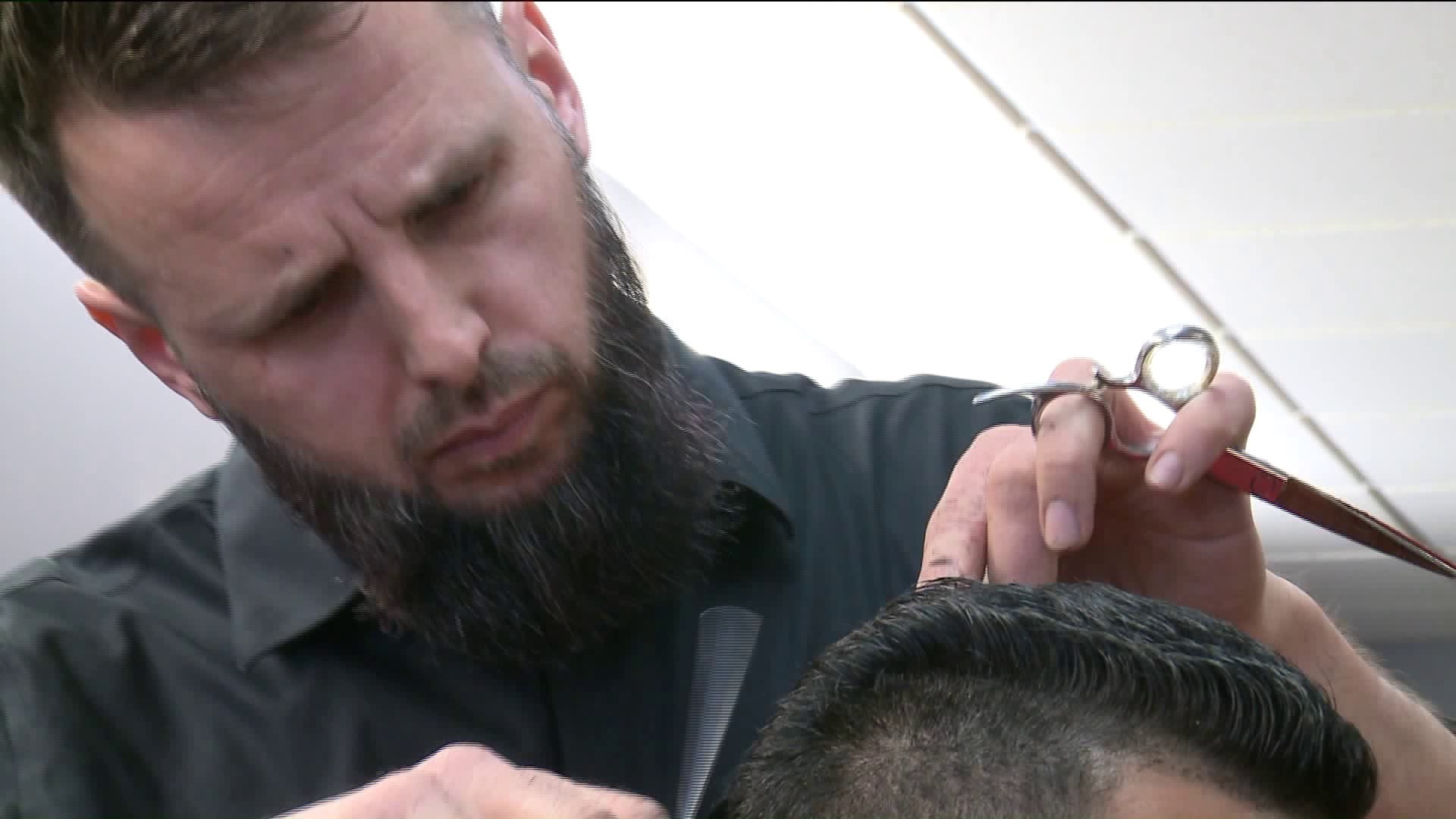 From refugee, to world champion barber