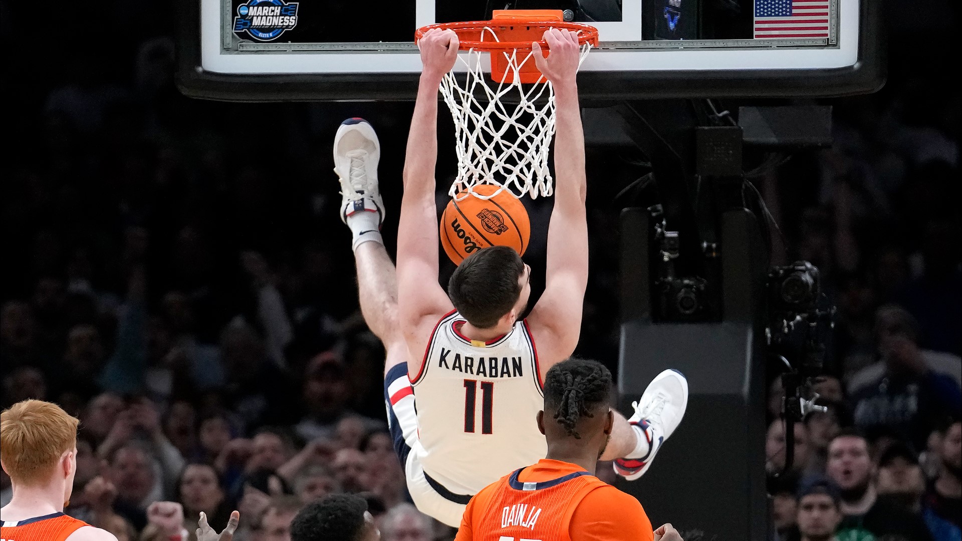 Karaban announced he will withdraw from the NBA Draft on Wednesday. He started on both the Huskies' back-to-back national championship teams.