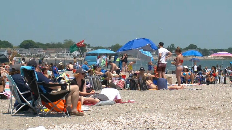 Summer-like weather brings thousands out to the beach