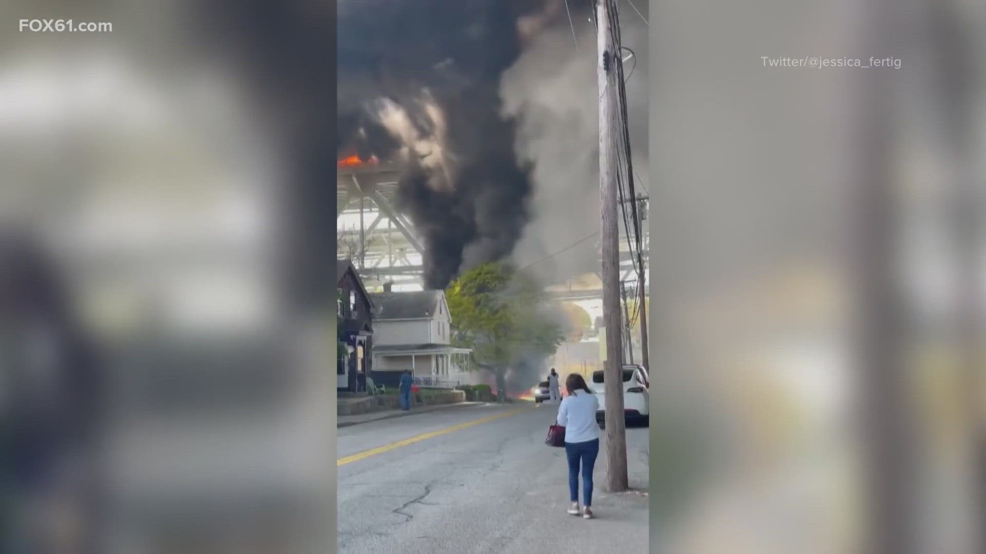 Buildings below the bridge were on fire, according to state police. Injuries were reported.