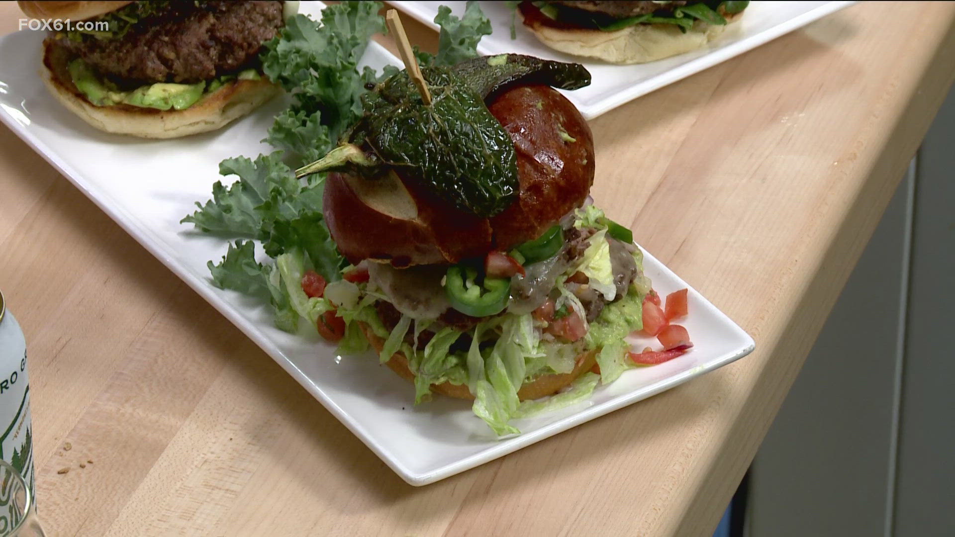 Director of Operations Rich Rebusman discusses an upcoming burger competition. 