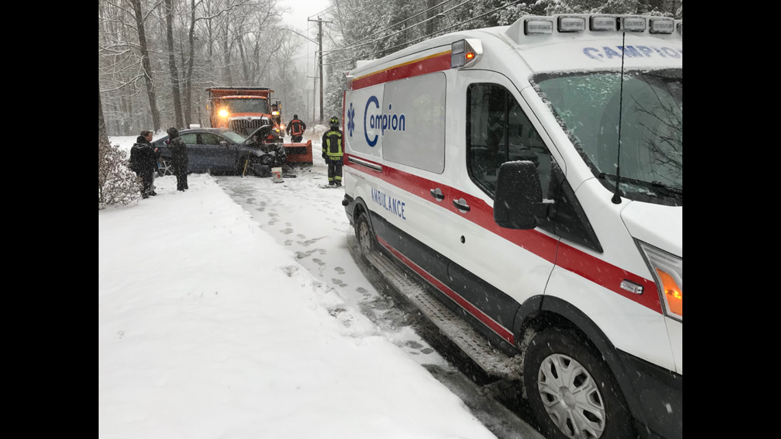 Road reopened in Torrington following collision involving car and plow