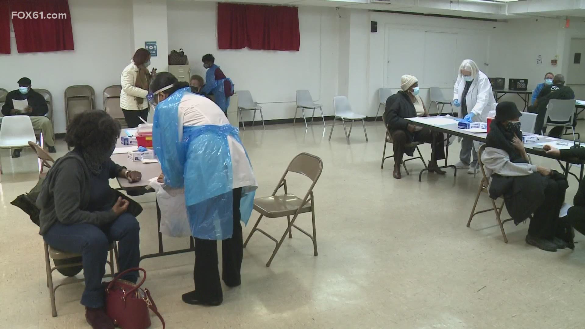 The arms race was on inside New Haven's Bethel AME Church hall Wednesday.