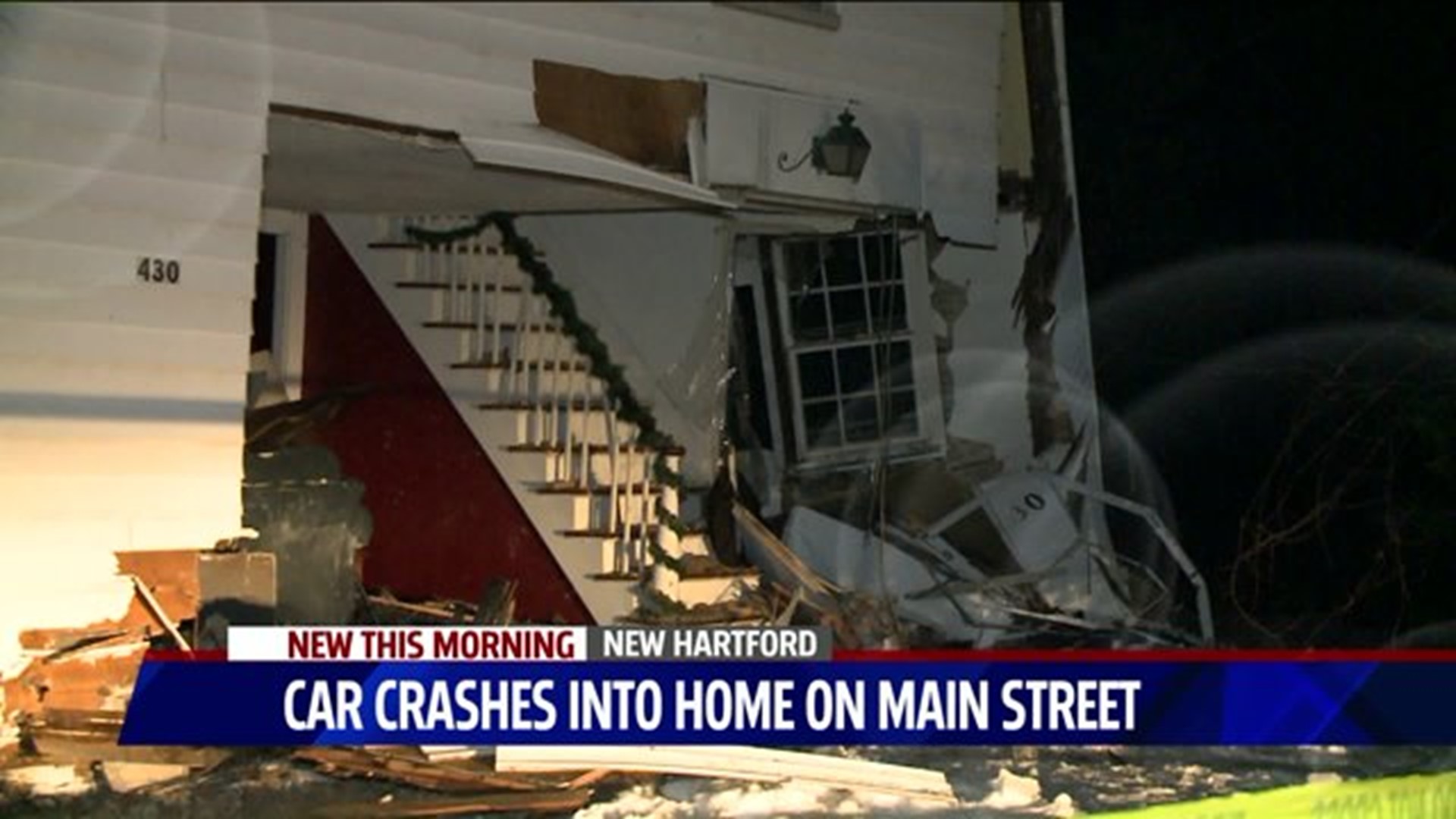Car crashes into New Hartford house