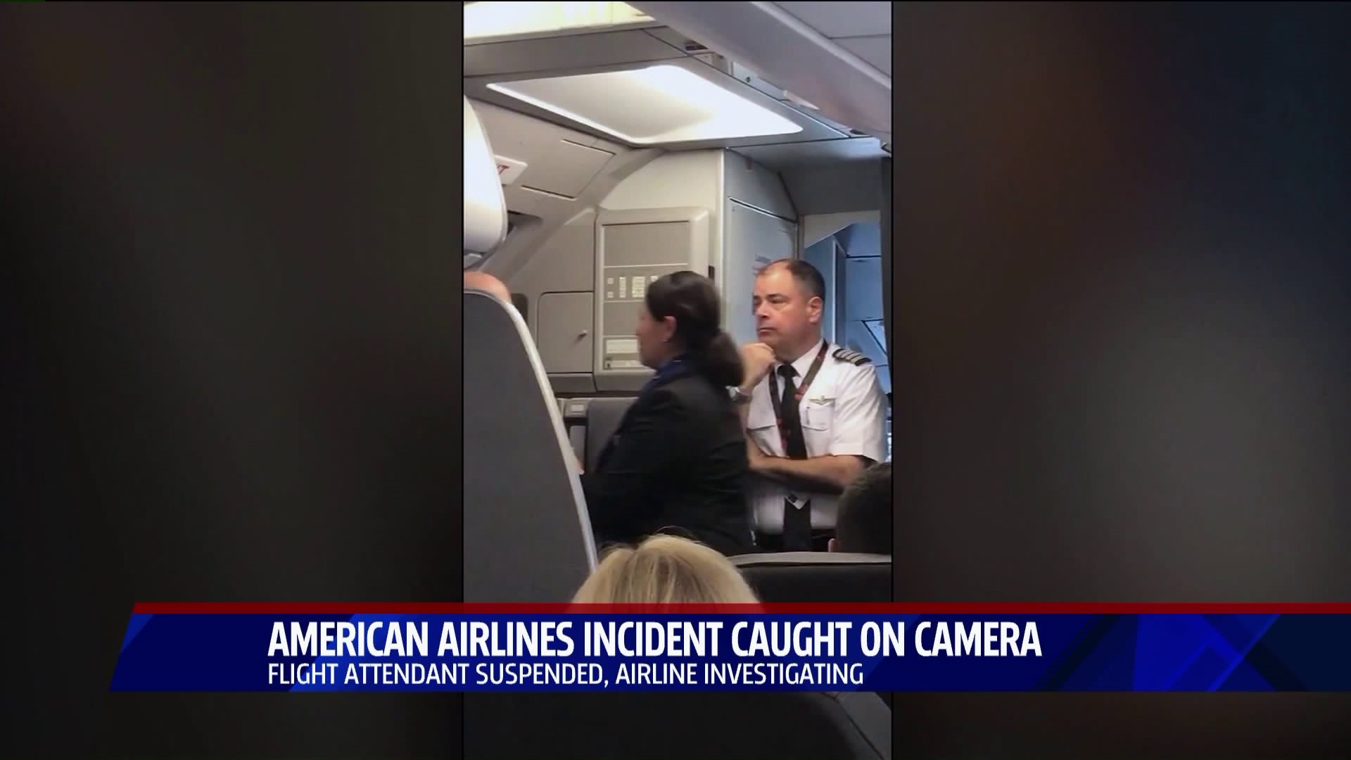 Video shows flight attendant telling passenger `hit me` following stroller incident; American Airlines investigating