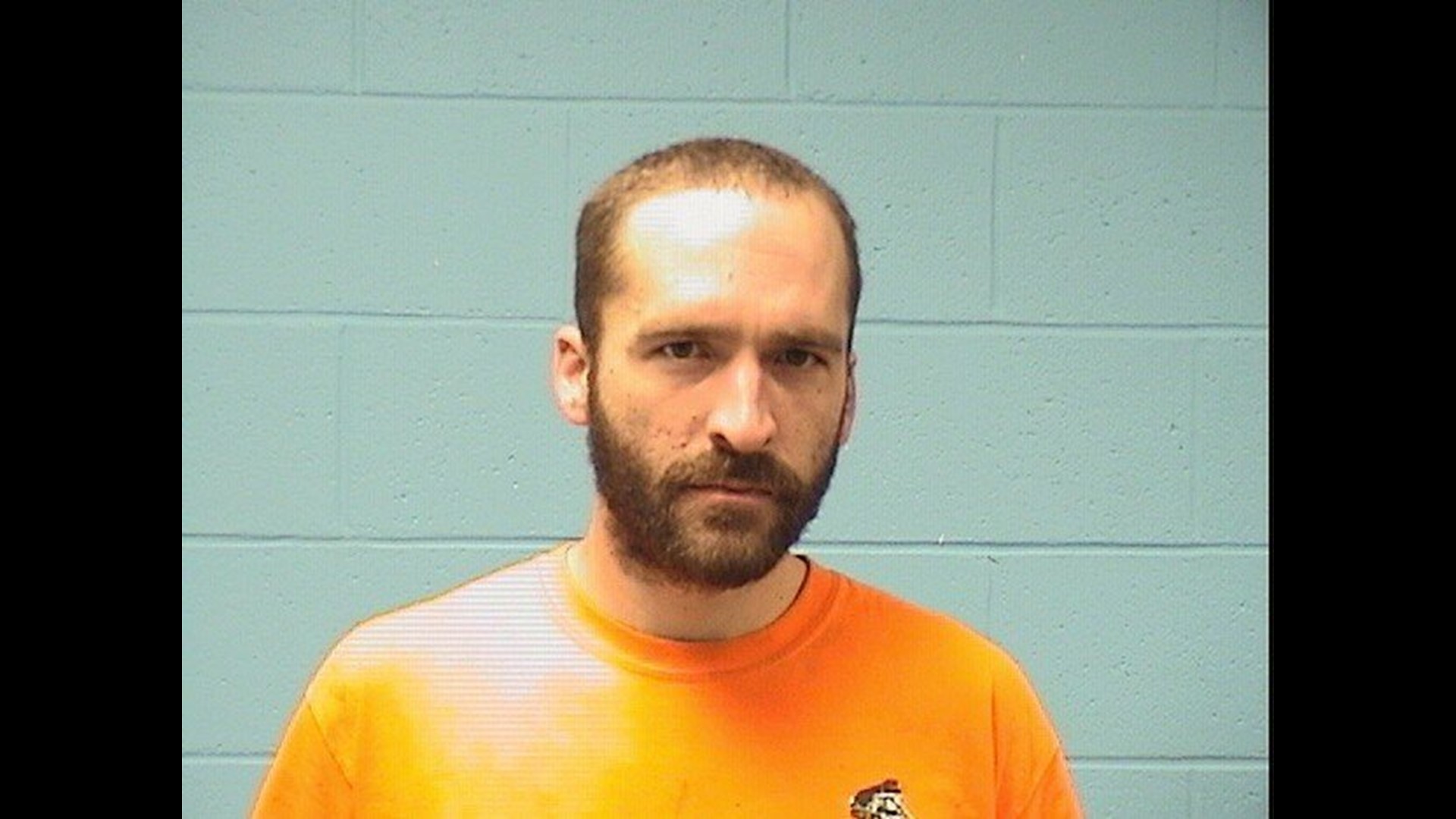 Bristol man arrested on robbery charges, found hiding in a home